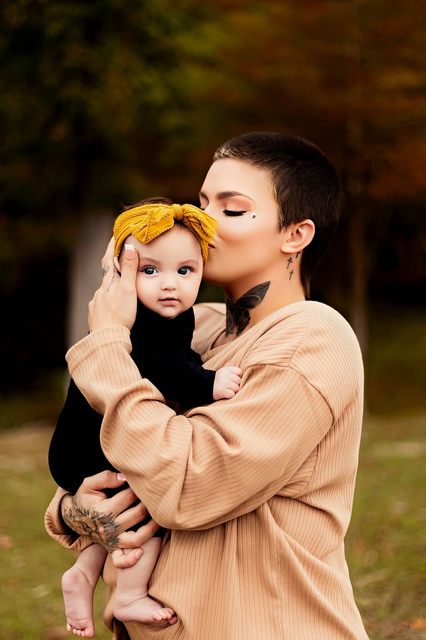 Frankie is registered to the contest to win money with this photo: child, dress, event, flash_photography, formal_wear, fun, gesture, grass, happy, hug, interaction, jewellery, leisure, people_in_nature, person, plant, recreation, romance, sitting, smile
