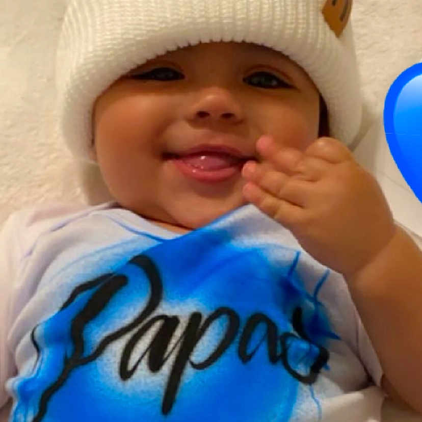 Christian joined the competition — help win amazing prizes! baby, babylaughing, bonnet, cap, clothing, face, happy, hat, head, person, smile