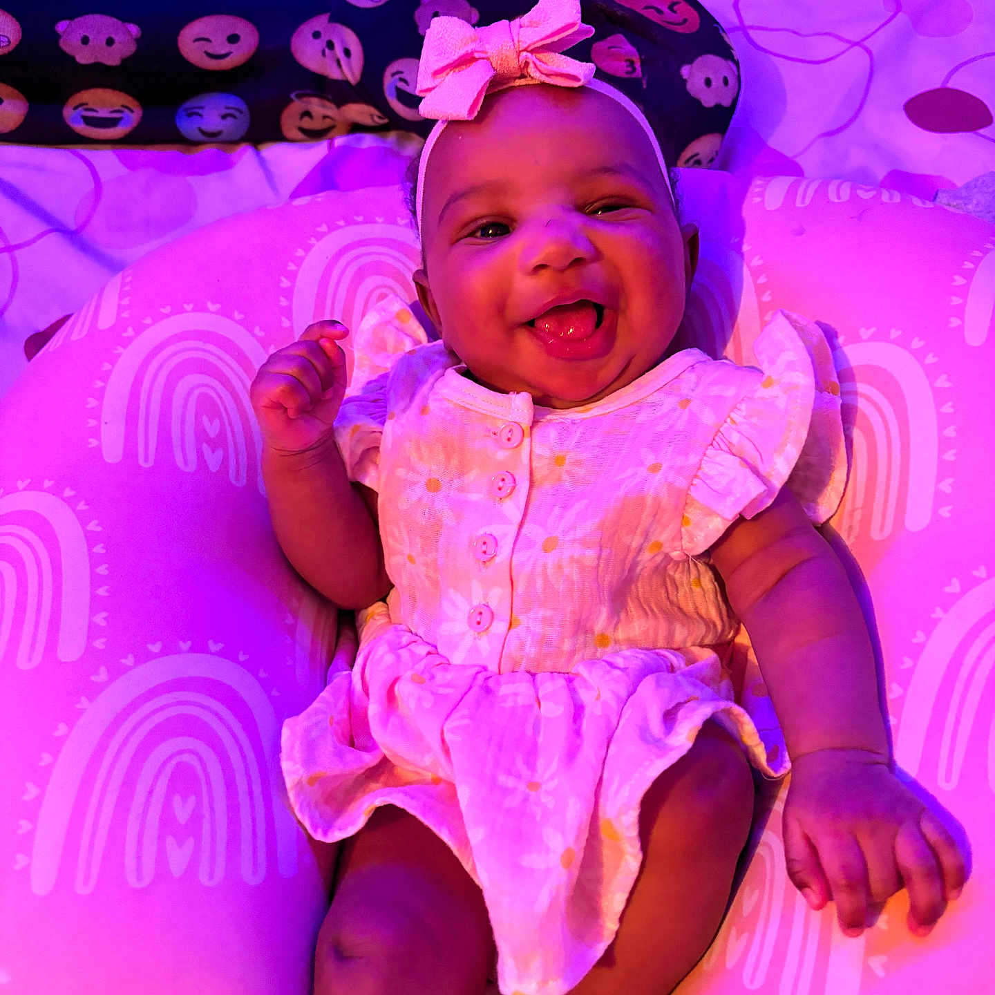 Arabella joined the competition — help win amazing prizes! accessories, baby, babylaughing, bodypart, clothing, couch, dress, face, finger, furniture, hand, happy, hat, head, laughing, person, photography, portrait, purple, smile