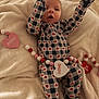 Kash is registered to the contest to win money with this photo: baby, infant, onesie, heart_pattern, blanket, valentine, beads, love, xoxo, be_mine, cute, child, sleepwear, soft, cozy, indoor, person, face, expression, lying_down