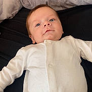 Kingsley is registered to the contest to win money with this photo: baby, bed, bedroom, clothing, coat, cushion, face, furniture, head, homedecor, indoors, longsleeve, newborn, pants, person, photography, portrait, room, shirt, sleeve