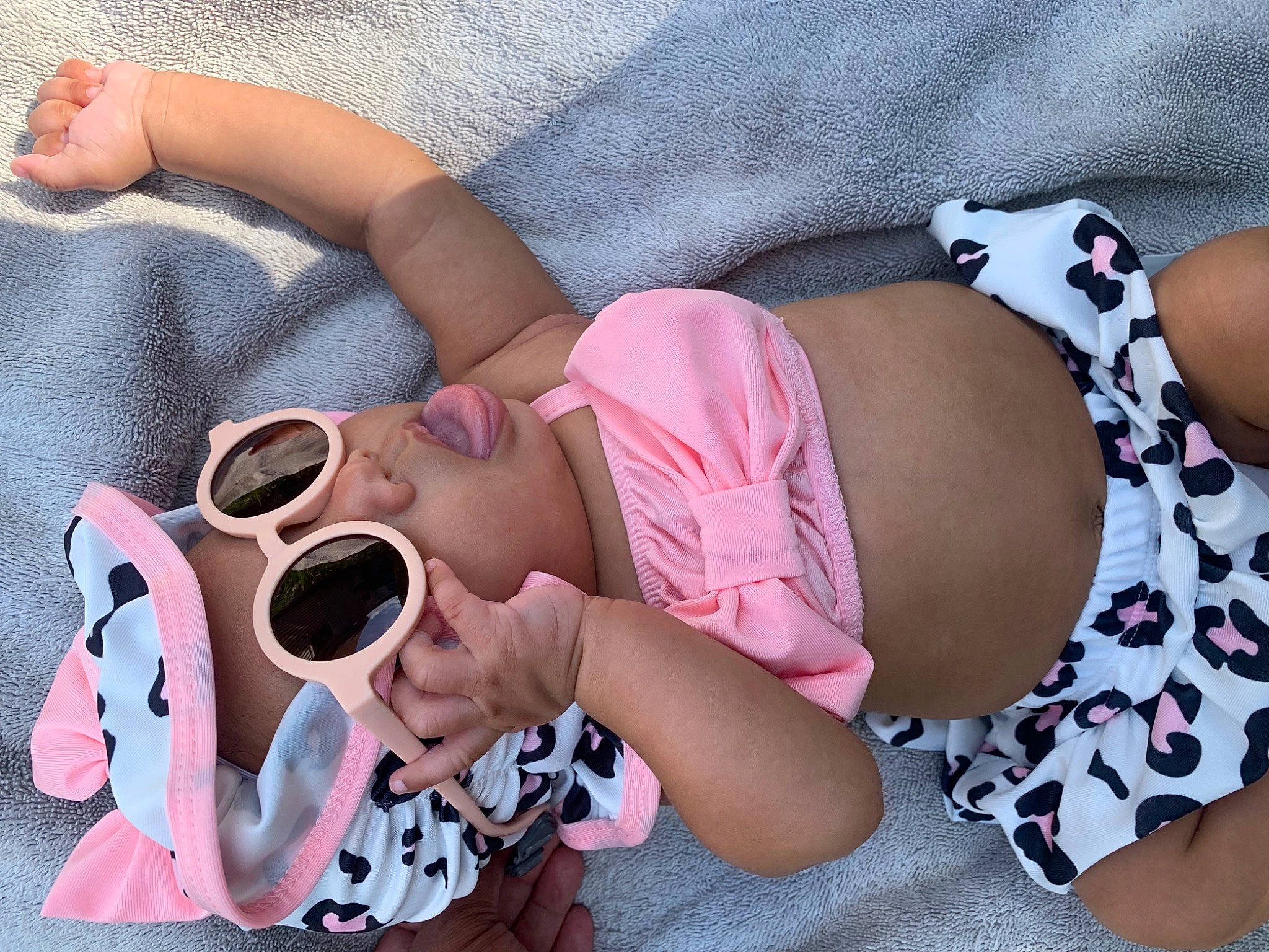 Rue joined the competition — help win amazing prizes! arm, baby_toddler_clothing, comfort, fashion, finger, glasses, goggles, hand, headgear, human_body, joint, leg, muscle, organ, person, pink, skin, sunglasses, textile, thigh