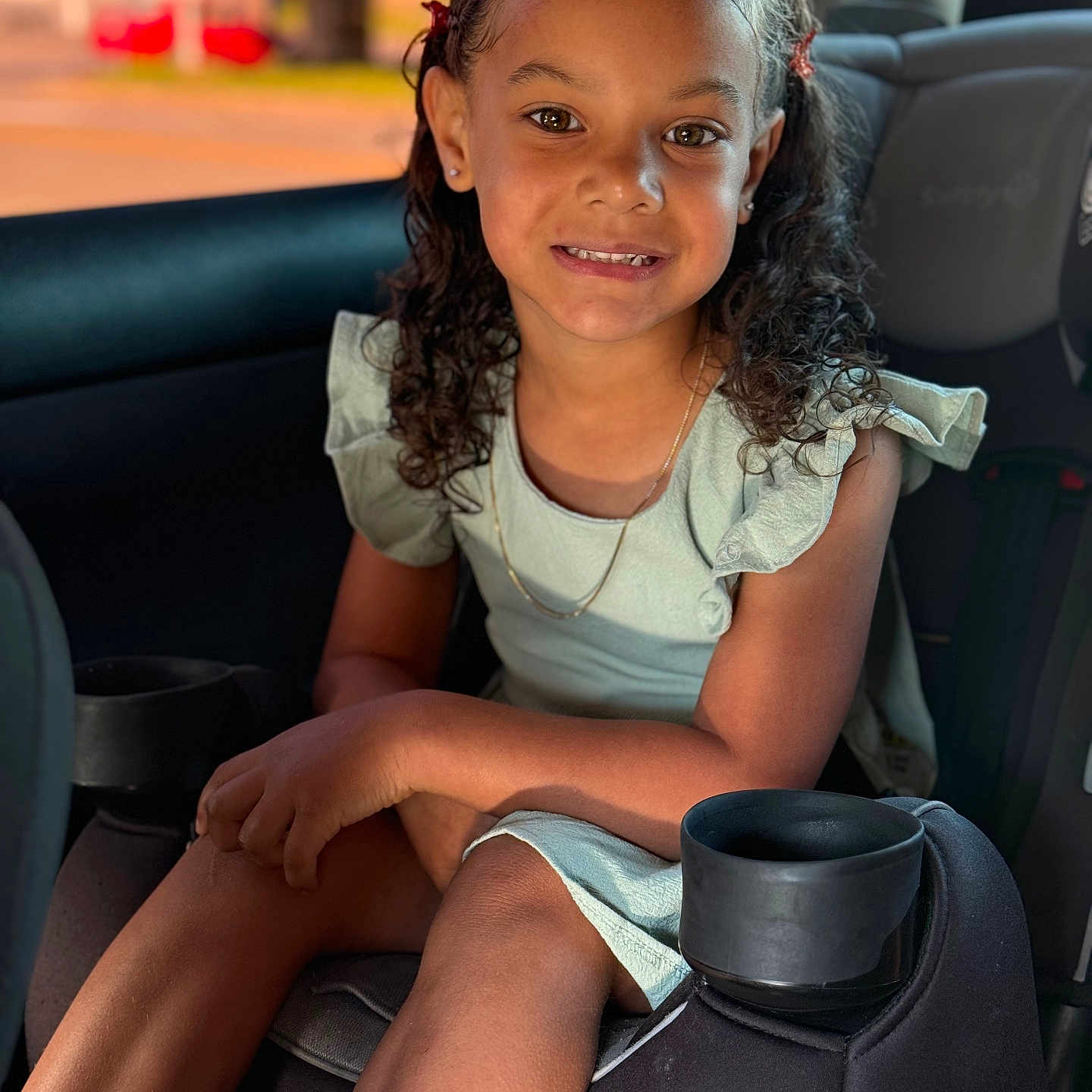 Alaia joined the competition — help win amazing prizes! accessories, child, curlyhair, cushion, face, female, girl, hair, happy, head, homedecor, jewelry, necklace, person, photography, portrait, sitting, smile, transportation, vehicle