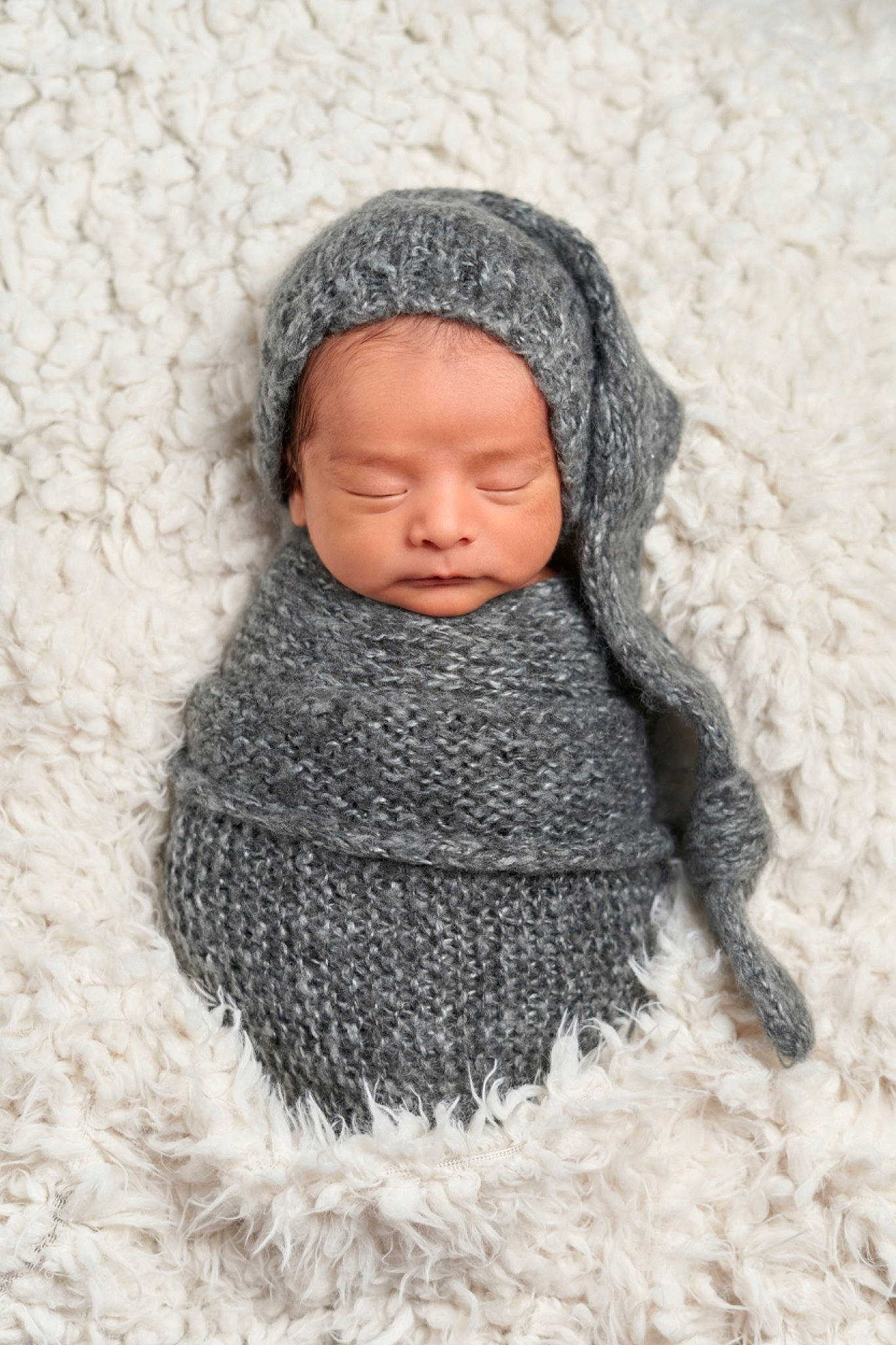 Benjamin joined the competition — help win amazing prizes! baby, cap, child, comfort, crochet, eye, face, fashion_accessory, fur, grey, head, headgear, headwear, human_body, knit_cap, outerwear, person, sleeve, textile, toddler