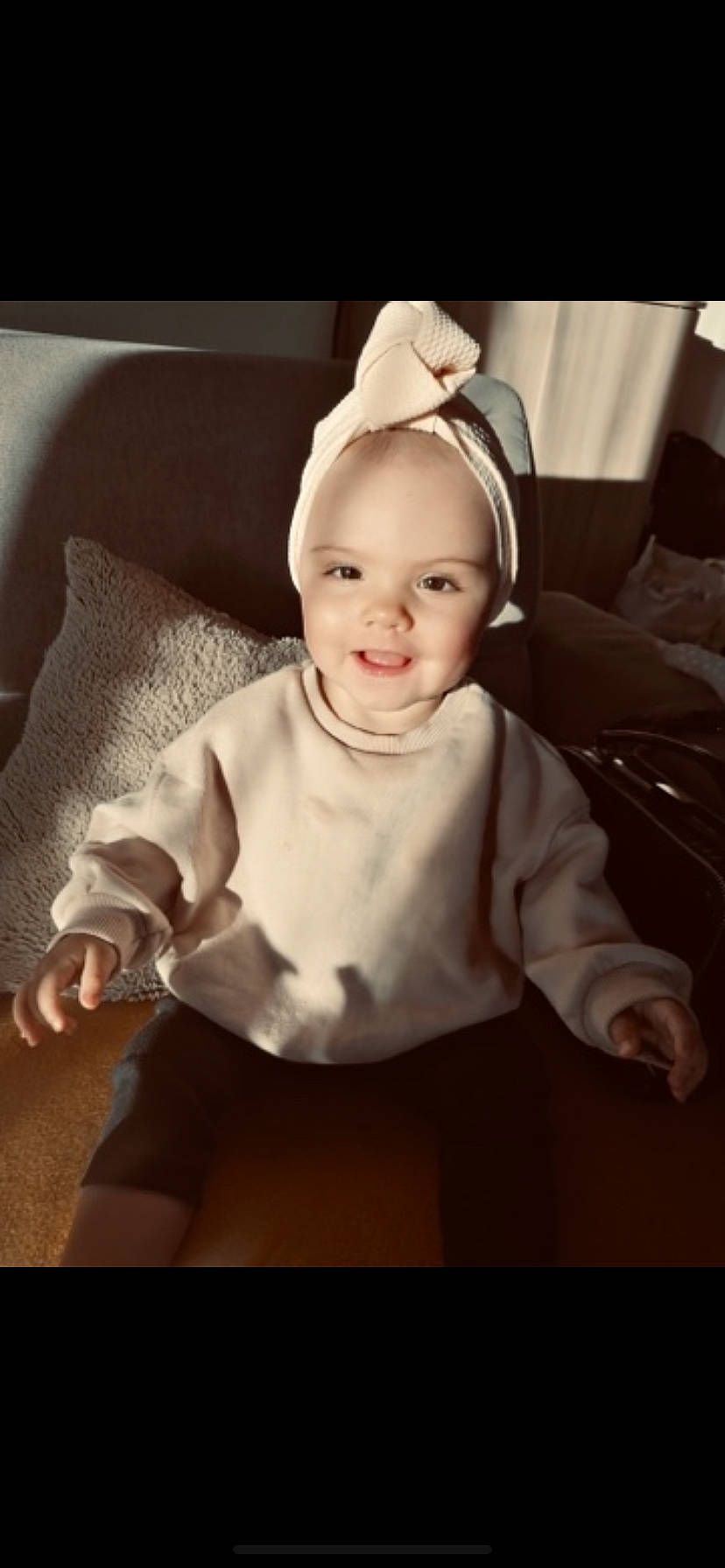 Lyla participe au concours pour gagner de l'argent avec cette photo : baby, baby_toddler_clothing, cap, cheek, cool, finger, flash_photography, fun, happy, human_body, iris, joy, lip, mouth, nose, person, sitting, skin, sleeve, smile