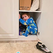 Samuel joined the competition — help win amazing prizes! toddler, child, pajamas, cabinet, kitchen, curious, playful, box, detergent, floor, rug, toy, hiding, curiosity, indoor, person, clothing, door, peek, mischief