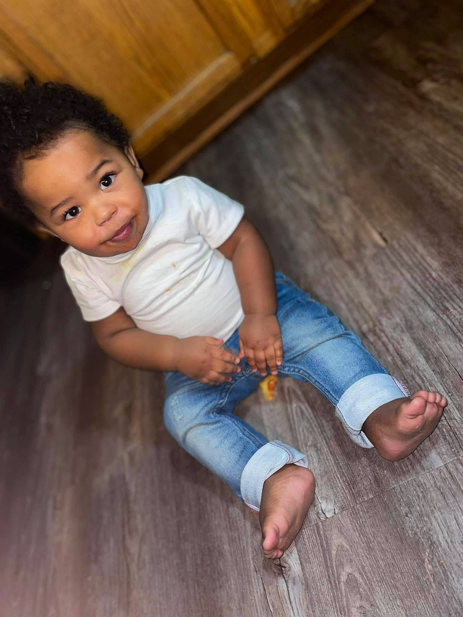 Markell joined the competition — help win amazing prizes! baby_toddler_clothing, barefoot, cheek, child, comfort, finger, flash_photography, floor, flooring, happy, hardwood, human_body, jeans, laminate_flooring, person, skin, smile, toddler, vertebrate, wood