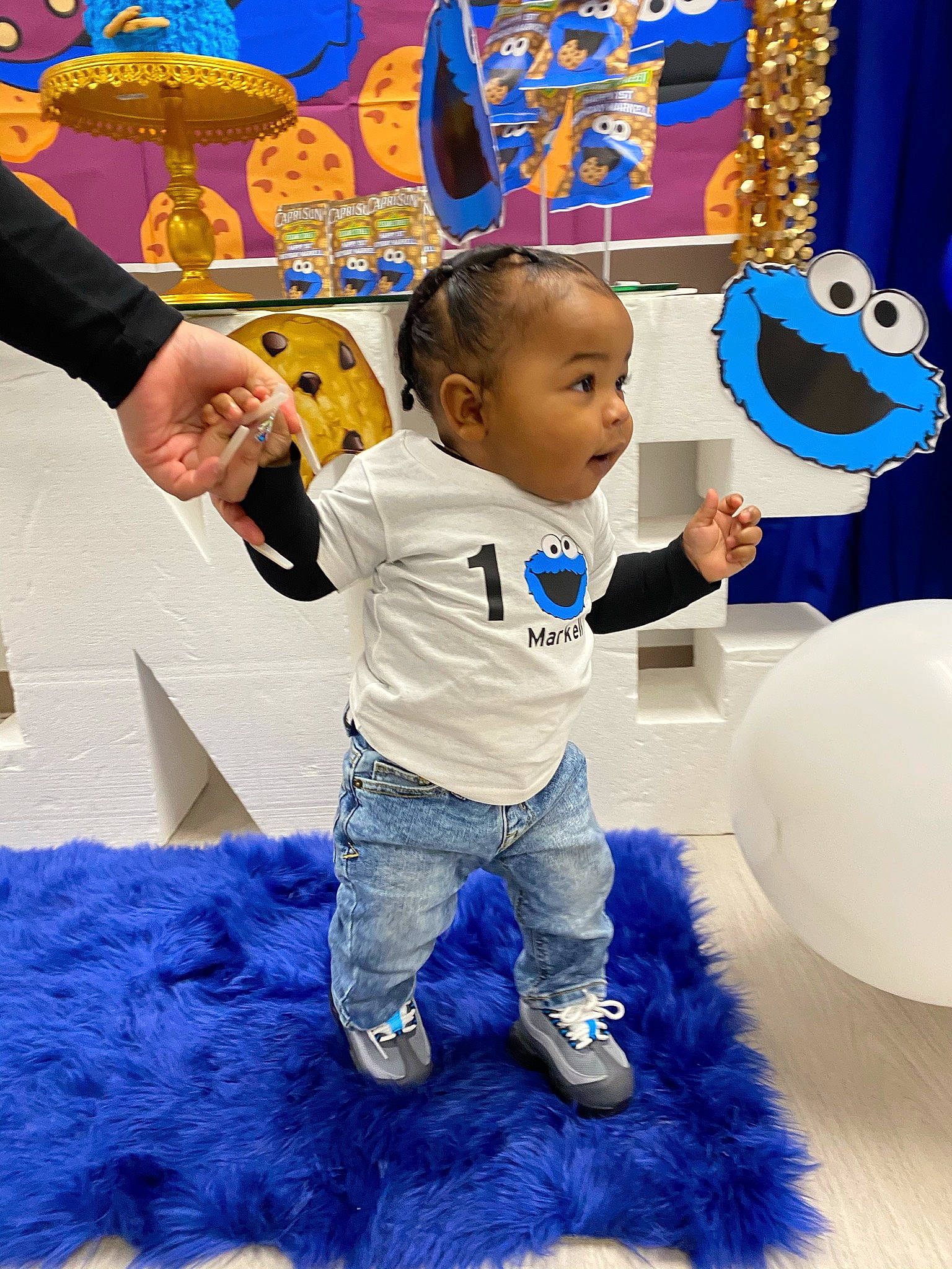 Markell joined the competition — help win amazing prizes! baby, baby_toddler_clothing, balloon, blue, child, electric_blue, event, fun, gesture, happy, leisure, person, photograph, play, recreation, snapshot, t_shirt, toddler, white, world