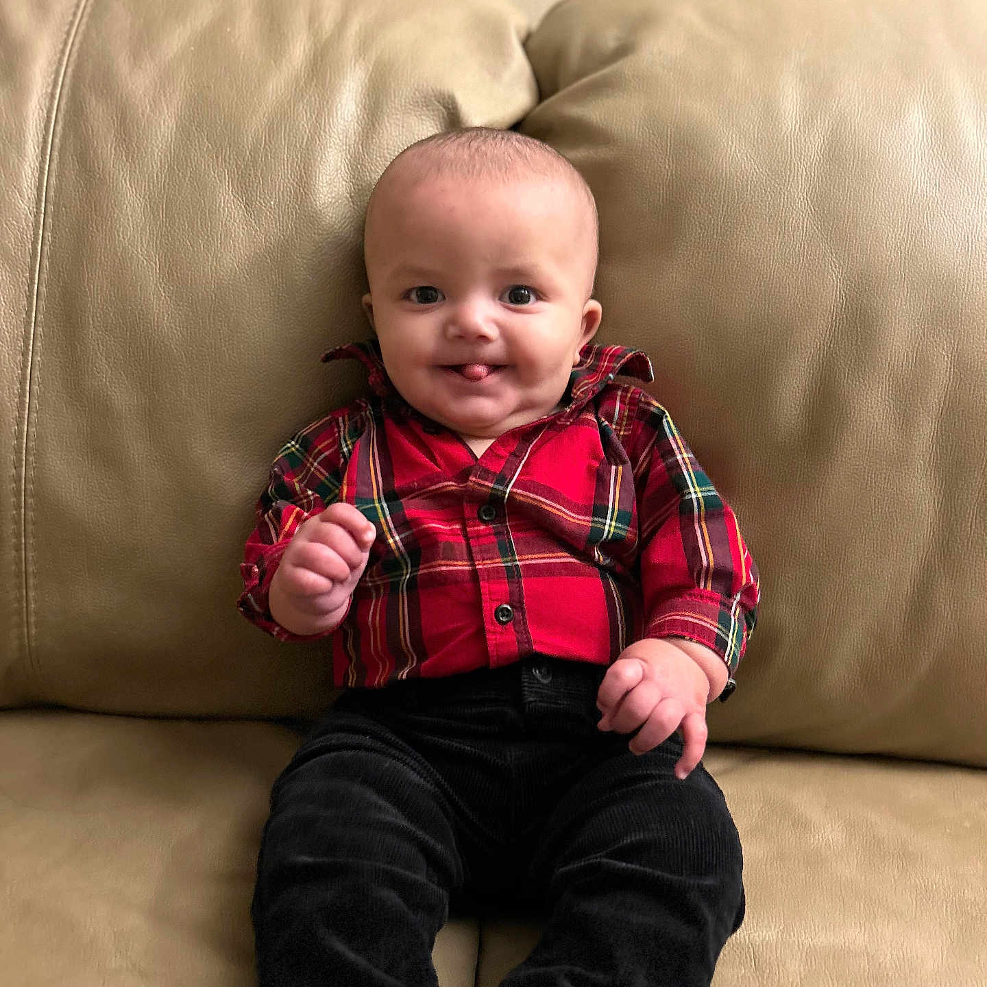 Bryson is registered to the contest to win money with this photo: baby, bodypart, clothing, coat, couch, cushion, face, furniture, happy, head, homedecor, jacket, jeans, pants, person, photography, portrait, shirt, sitting, smile