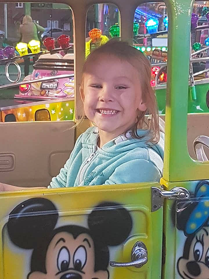 Lilly Mae joined the competition — help win amazing prizes! amusement_park, amusement_ride, bus, child, cool, ear, eye, facial_expression, fictional_character, fun, happy, joy, person, play, school_bus, selfie, smile, toddler, toy, vacation