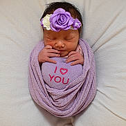 Rosie joined the competition — help win amazing prizes! newborn, baby, infant, wrapped, blanket, plush, heart, purple, headband, flowers, sleeping, cute, soft, cozy, love, hands, portrait, peaceful, resting, toddler