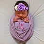 Rosie is registered to the contest to win money with this photo: newborn, baby, infant, swaddled, blanket, purple, heart, plush, headband, flower, sleeping, peaceful, cute, soft, cushion, portrait, child, love, cozy, resting