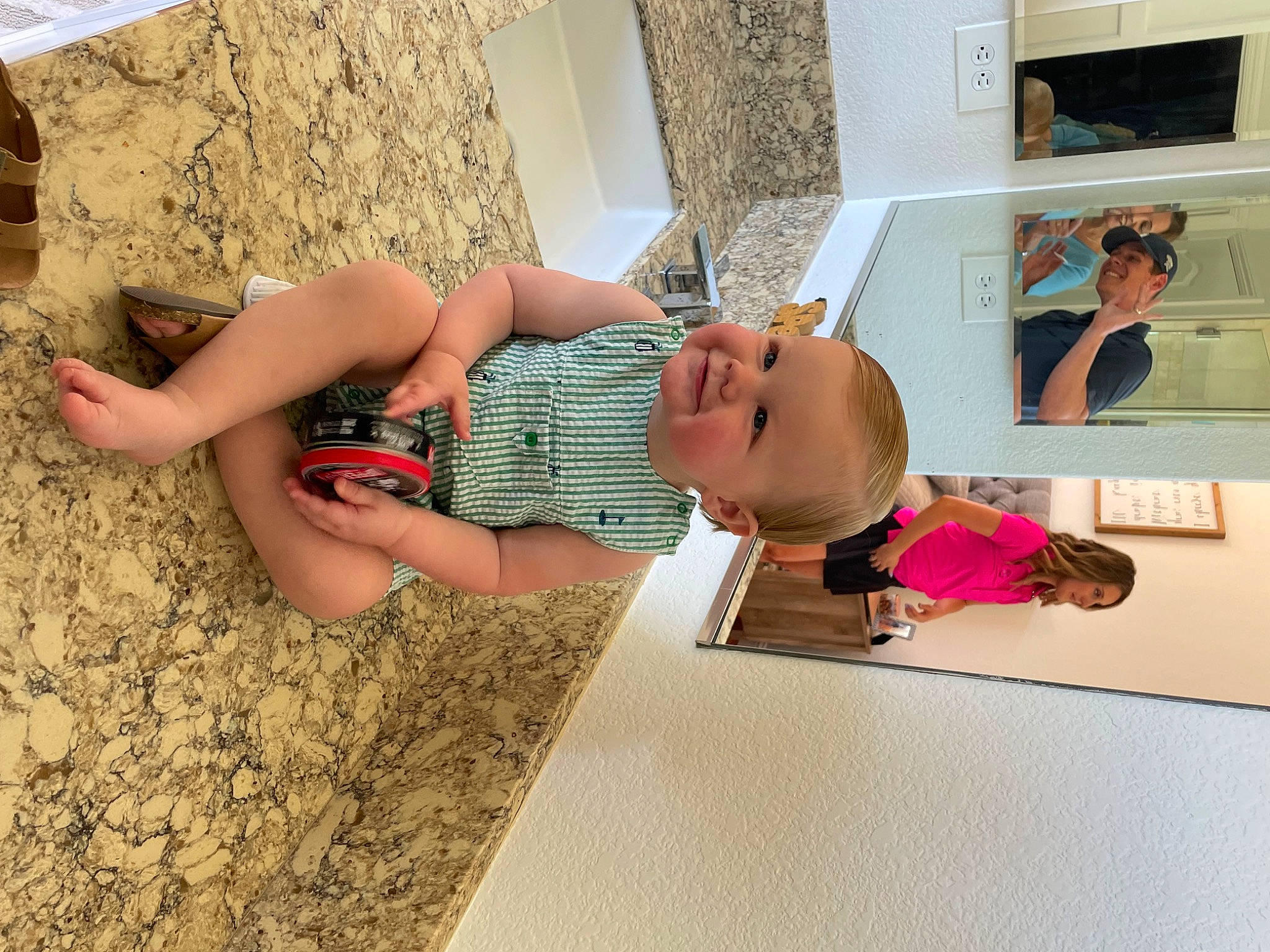 Brooks is registered to the contest to win money with this photo: adaptation, art, baby, child, dress, floor, flooring, happy, headwear, house, human_leg, joy, leisure, pattern, person, room, shorts, smile, t_shirt, thigh