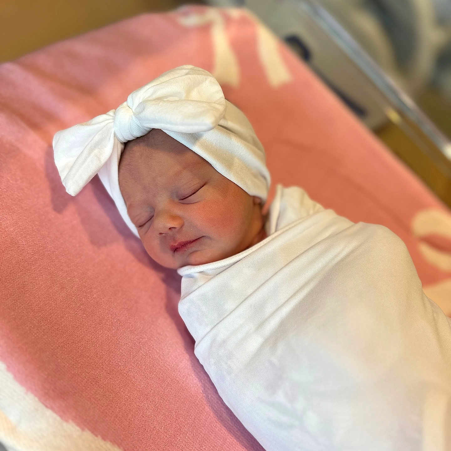 Paisley joined the competition — help win amazing prizes! architecture, baby, bed, blanket, bonnet, building, childbirth, clothing, face, furniture, glove, hat, head, hospital, newborn, person, photography, portrait, sleeping, towel