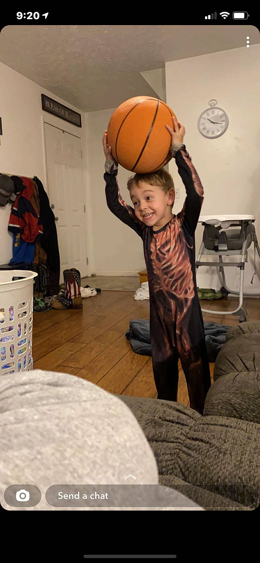 Grey is registered to the contest to win money with this photo: baby, ball, basketball, basketball_player, child, flooring, football, fun, hardwood, joy, person, personal_protective_equipment, player, room, smile, soccer_ball, sports_equipment, sports_toy, sportswear, toddler