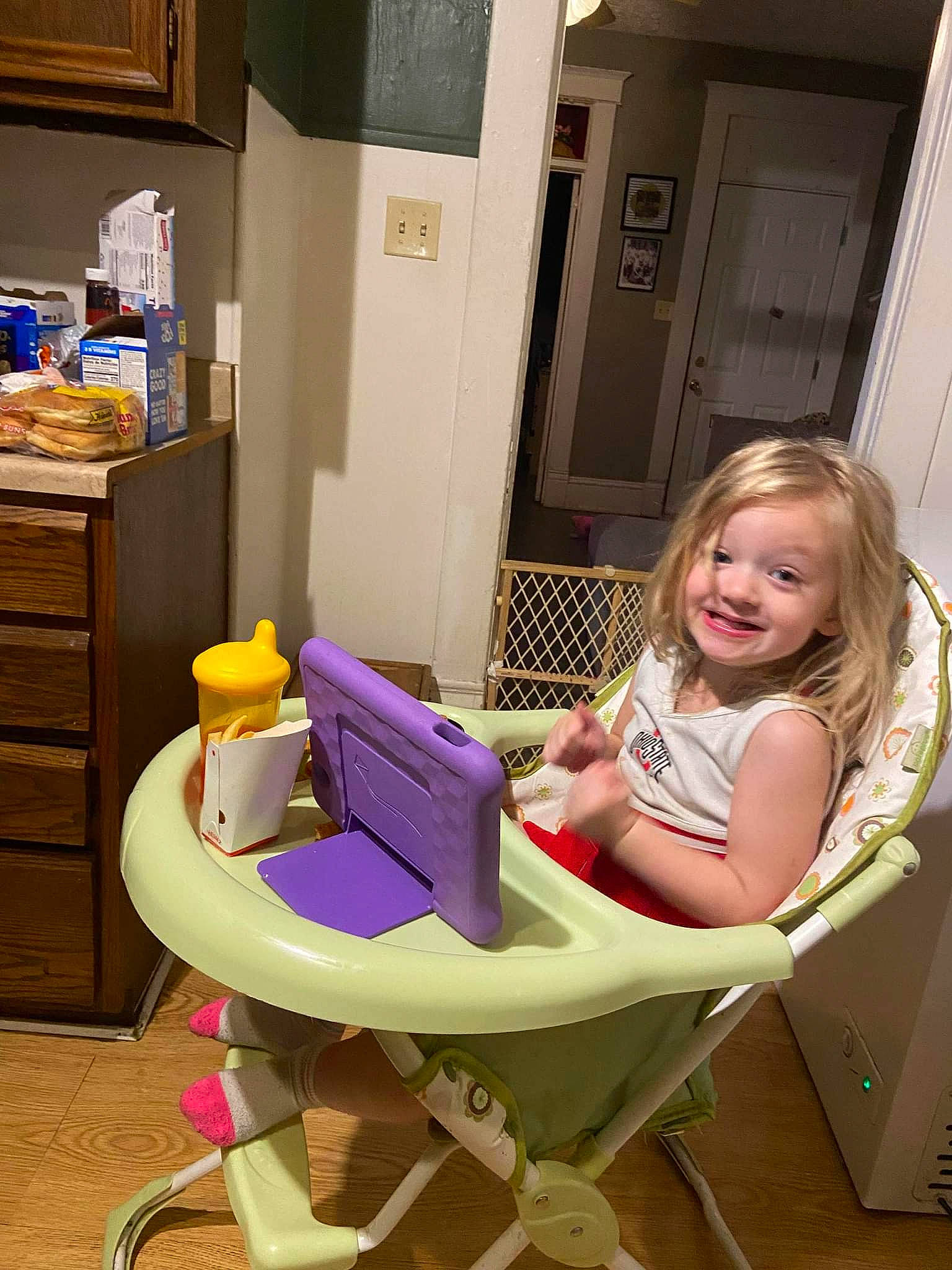 Addilynne joined the competition — help win amazing prizes! cabinetry, chair, child, comfort, drawer, flooring, fun, hair, joy, leg, leisure, magenta, person, purple, room, service, sitting, smile, tire, toddler