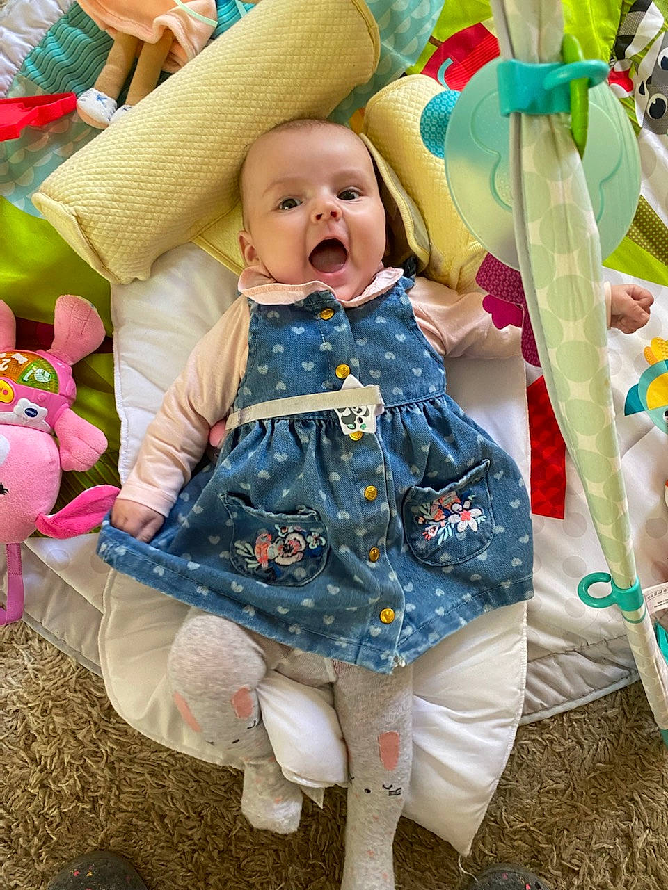 Sharlie participe au concours pour gagner de l'argent avec cette photo : baby, baby_products, baby_toddler_clothing, child, comfort, dress, fun, grass, green, happy, linens, pattern, person, photograph, pink, purple, sitting, sleeve, smile, textile