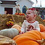 baby, child, pumpkin, hay_bale, thanksgiving, autumn, fall, outdoor, smiling, headband, festive, church, scarecrow, flowers, grass, holiday, orange, white, celebration, seasonal