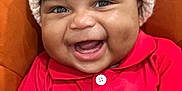 Alexander joined the competition — help win amazing prizes! baby, bright, buttoned_shirt, child, closeup, clothing, cute, cute_expression, face, happy, hat, indoor, infant, knit_hat, plush_background, portrait, red_shirt, seated, smiling, warm_colors