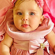 Liz Angeli is registered to the contest to win money with this photo: baby, child, pink_dress, bow, headband, flower, portrait, cute, infant, closeup, soft_lighting, indoor, skin, face, eyes, adorable, baby_girl, clothing, cute_expression, fabric