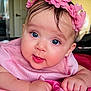Liz Angeli is registered to the contest to win money with this photo: baby, child, infant, blue_eyes, pink_dress, flower_headband, cute, close_up, indoor, portrait, hands, soft_fabric, resting, smiling, skin, person, young, adorable, looking, face