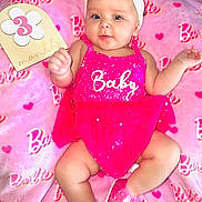 Liz Angeli joined the competition — help win amazing prizes! baby, infant, pink, dress, headband, shoes, blanket, milestone, months, smiling, cute, child, portrait, happy, indoors, soft_texture, barbie, toddler, clothing, accessory