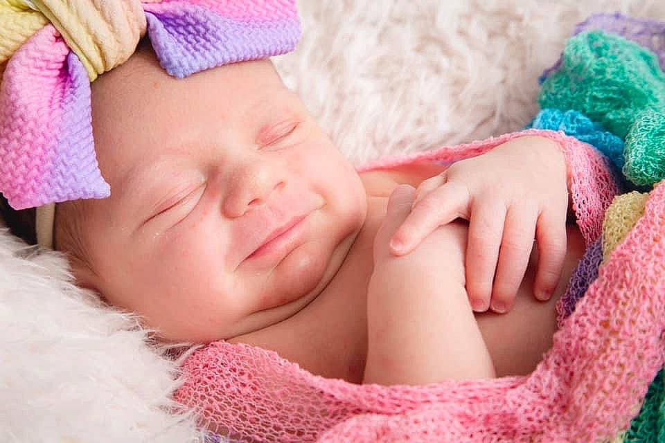 Bailey joined the competition — help win amazing prizes! baby, baby_sleeping, baby_toddler_clothing, comfort, eyelash, finger, green, hand, happy, headgear, headwear, lip, nail, neck, nose, person, pink, product, red, skin