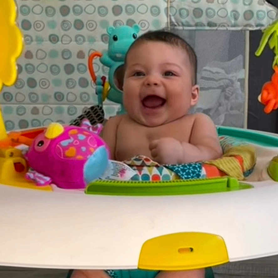 Avery is registered to the contest to win money with this photo: activity_center, baby, bright, cheerful, child, colorful, cute, development, early_childhood, face, feet, fun, happy, indoor, infant, legs, playtime, sitting, smile, toy