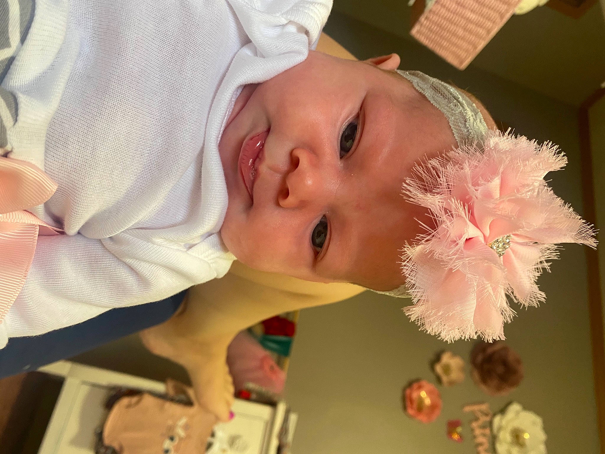 Alexandria joined the competition — help win amazing prizes! baby_toddler_clothing, child, dress, event, eyebrow, eyelash, face, fashion_accessory, hair_accessory, hairstyle, happy, hat, headpiece, lip, nose, person, petal, pink, skin, smile