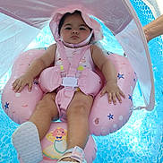 Ema joined the competition — help win amazing prizes! baby, child, pool, water, float, pink, sunshade, swimming, infant, summer, outdoor, sandal, cute, relaxing, safety, person, fun, toy, swimwear, hand
