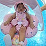 baby, child, pool, water, float, pink, sunshade, swimming, infant, summer, outdoor, sandal, cute, relaxing, safety, person, fun, toy, swimwear, hand