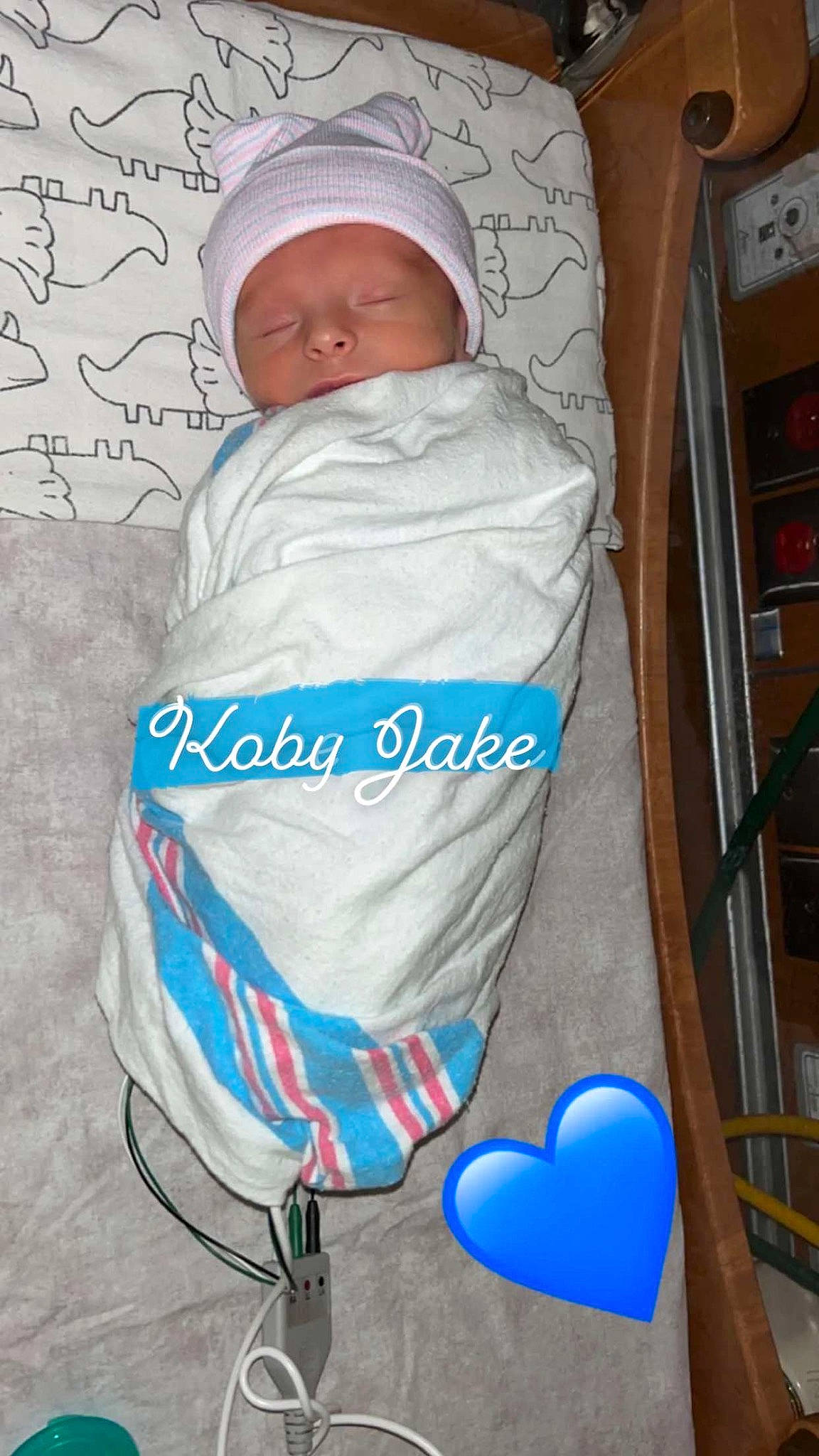 Koby joined the competition — help win amazing prizes! baby, baby_products, baby_safety, baby_sleeping, baby_toddler_clothing, cabinetry, cap, child, comfort, electric_blue, font, hat, infant_bed, linens, person, photo_caption, room, shelf, sitting, toddler