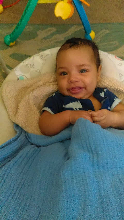 Gianni is registered to the contest to win money with this photo: baby, cheek, child, eye, face, fun, head, iris, lip, nose, person, product, skin, smile, toddler