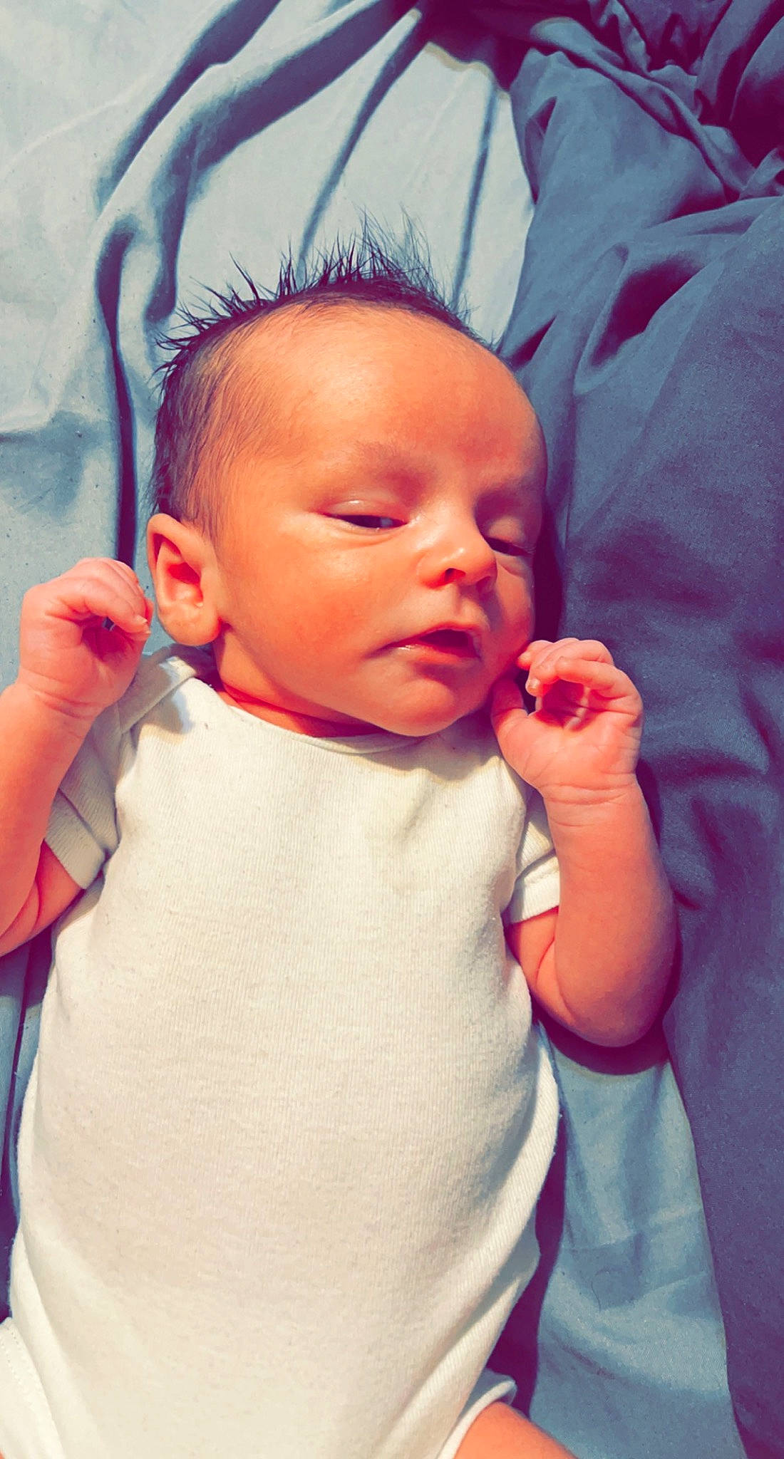 Kenai is registered to the contest to win money with this photo: baby, baby_toddler_clothing, cheek, chin, comfort, ear, eye, eyebrow, eyelash, face, gesture, hair, head, iris, lip, mouth, neck, nose, person, skin