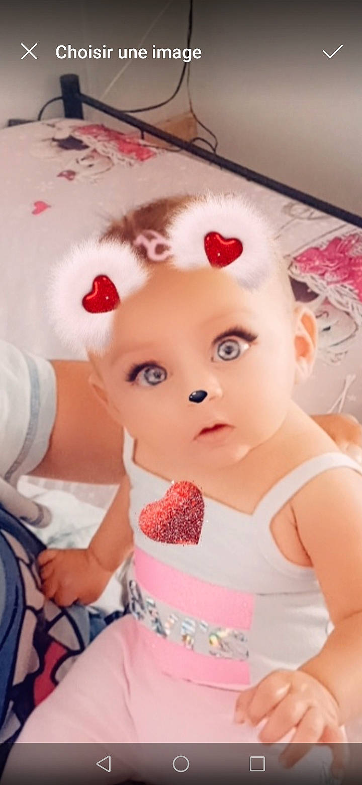 Mariana participe au concours pour gagner de l'argent avec cette photo : baby, baby_toddler_clothing, cheek, child, clothing, dress, eye, eyelash, fashion_design, finger, hair_accessory, happy, head, headpiece, lip, peach, person, pink, skin, textile