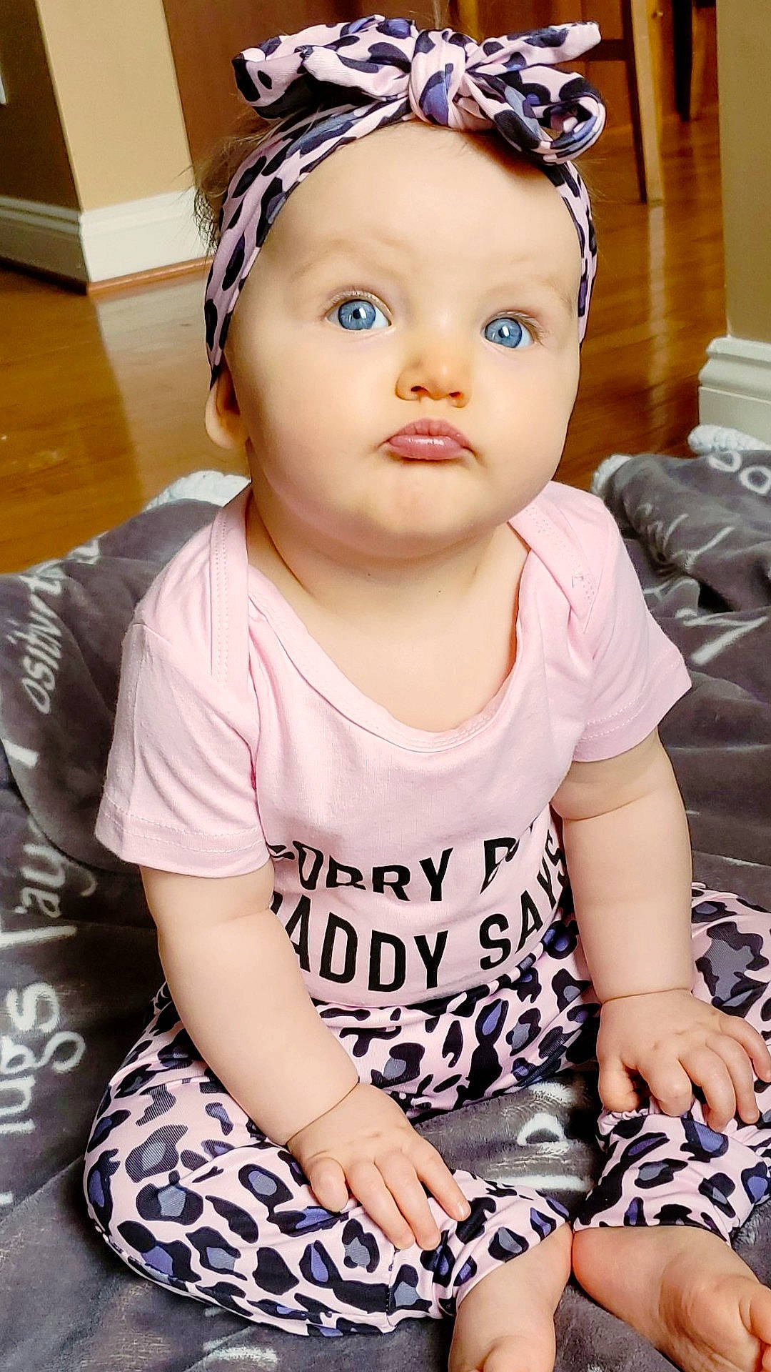 Astraea is registered to the contest to win money with this photo: baby, baby_toddler_clothing, cheek, child, child_model, clothing, cool, fashion_accessory, hair_accessory, head, headband, headgear, headwear, pattern, person, skin, sleeve, t_shirt, toddler