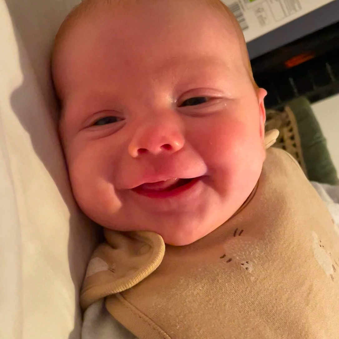 Finley is registered to the contest to win money with this photo: architecture, baby, blanket, building, computerhardware, cushion, electronics, face, furniture, happy, hardware, head, homedecor, hospital, laughing, newborn, person, photography, portrait, smile