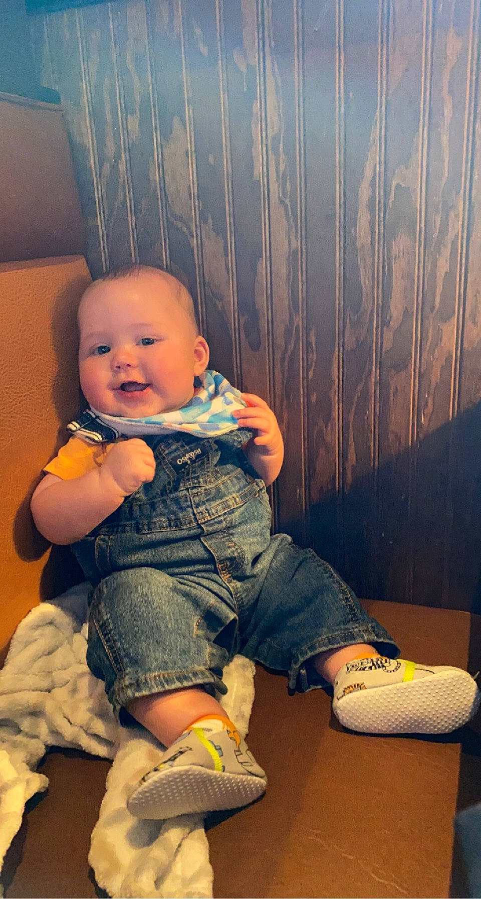 Warren is registered to the contest to win money with this photo: arm, baby, baby_toddler_clothing, cheek, clothing, comfort, finger, flash_photography, floor, flooring, happy, human_body, iris, leg, mouth, person, skin, sleeve, smile, standing