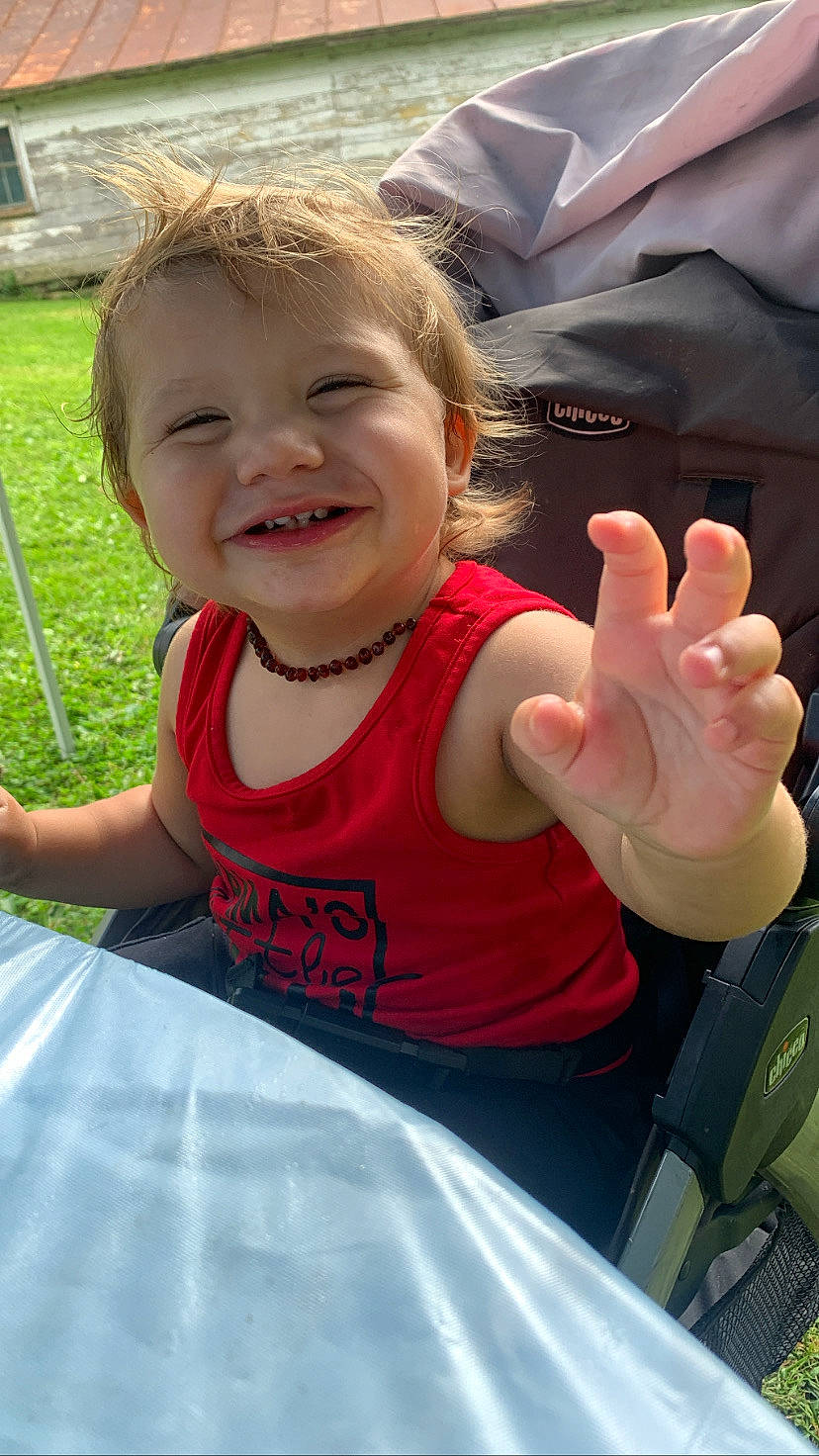Ronald joined the competition — help win amazing prizes! baby_toddler_clothing, child, cool, facial_expression, finger, fun, gesture, grass, hairstyle, hand, happy, joy, leisure, mouth, person, pink, product, recreation, skin, smile