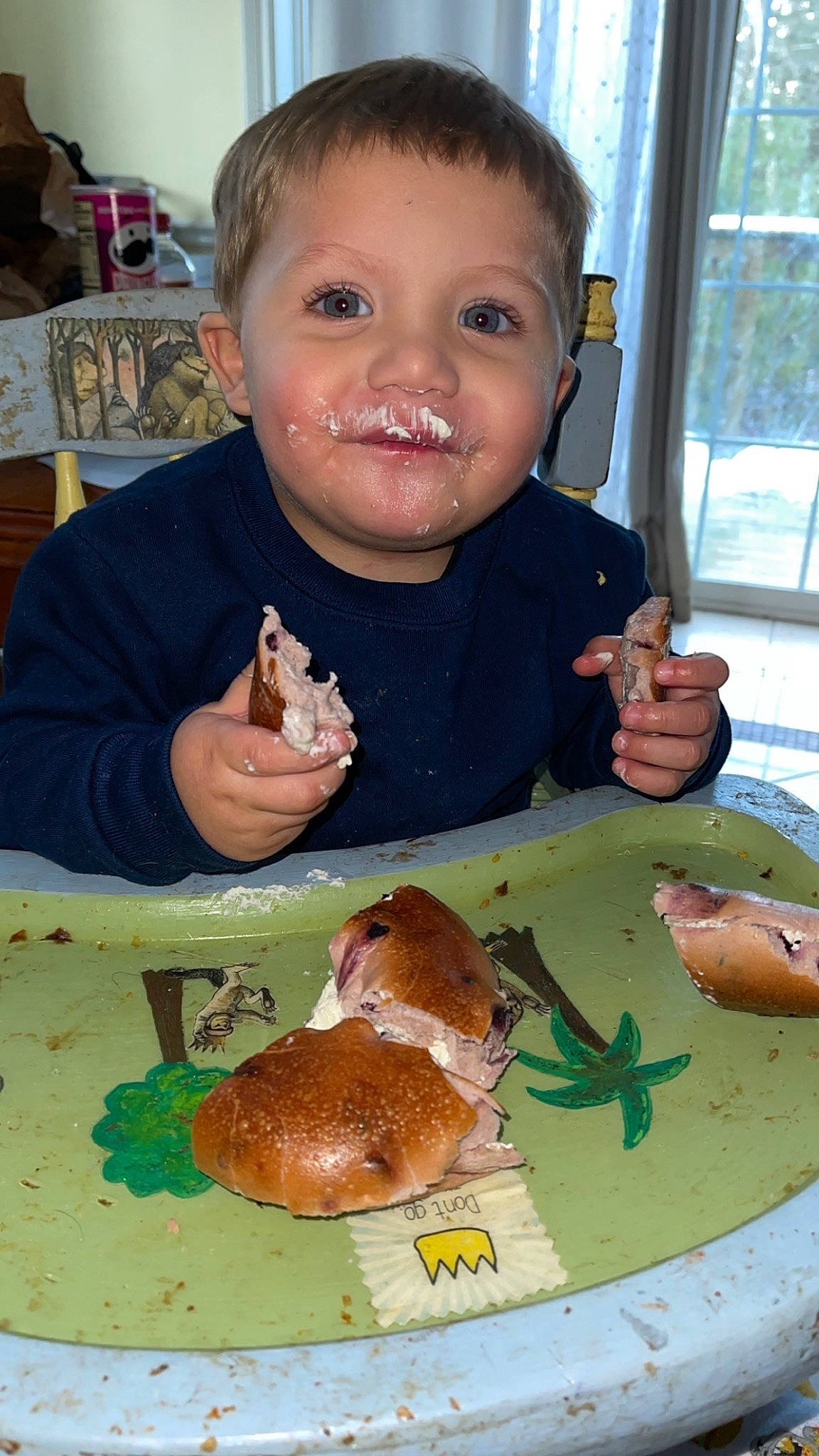 Ronald is registered to the contest to win money with this photo: baked_goods, chair, comfort_food, cuisine, curtain, dish, fast_food, food, food_craving, ingredient, knife, person, plate, produce, recipe, smile, t_shirt, tableware, toddler, window