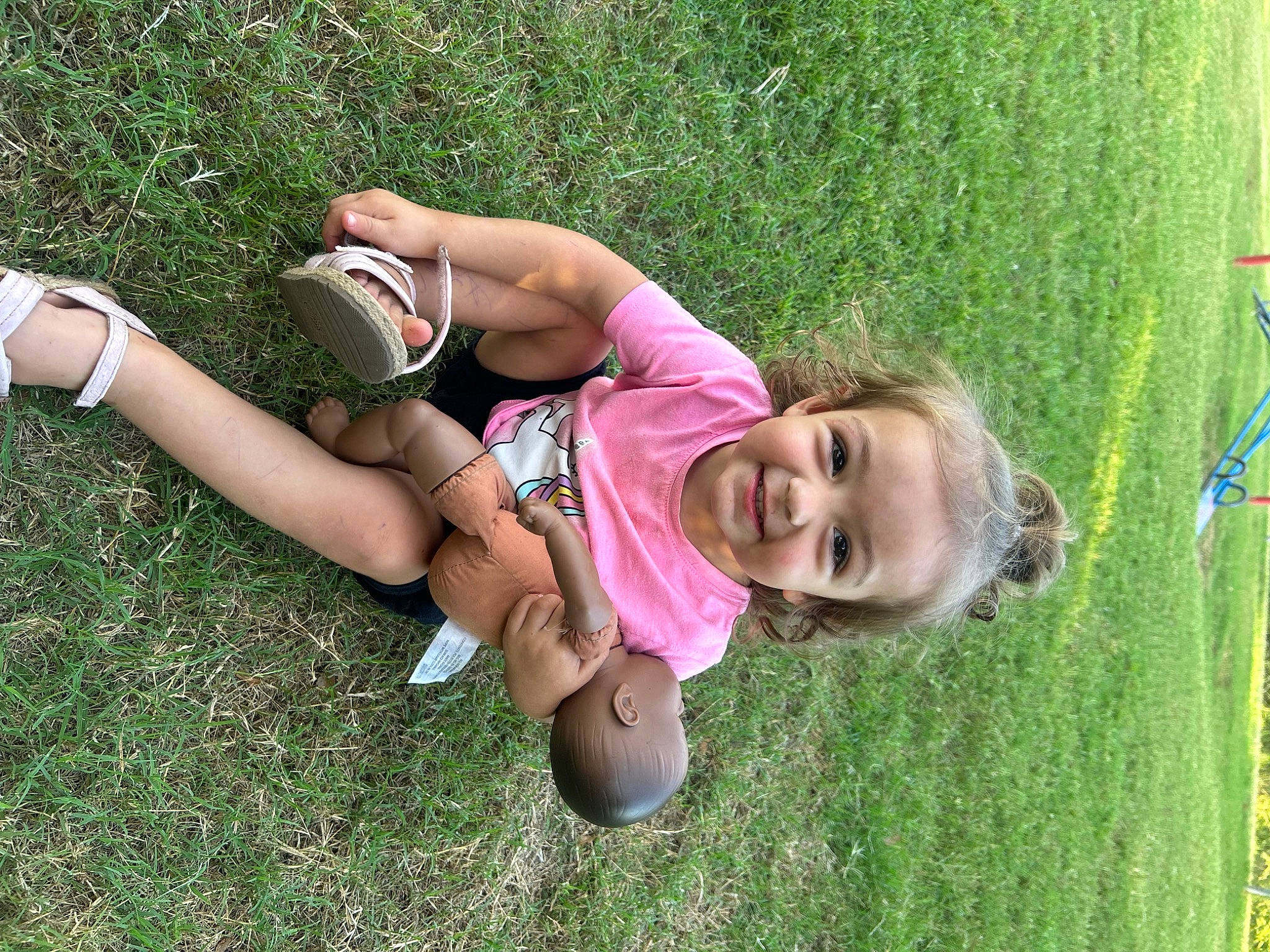 Bailie is registered to the contest to win money with this photo: blond, child, foot, fun, grass, grass_family, grassland, happy, human_leg, joy, knee, lawn, leisure, meadow, people_in_nature, person, plant, recreation, shorts, smile
