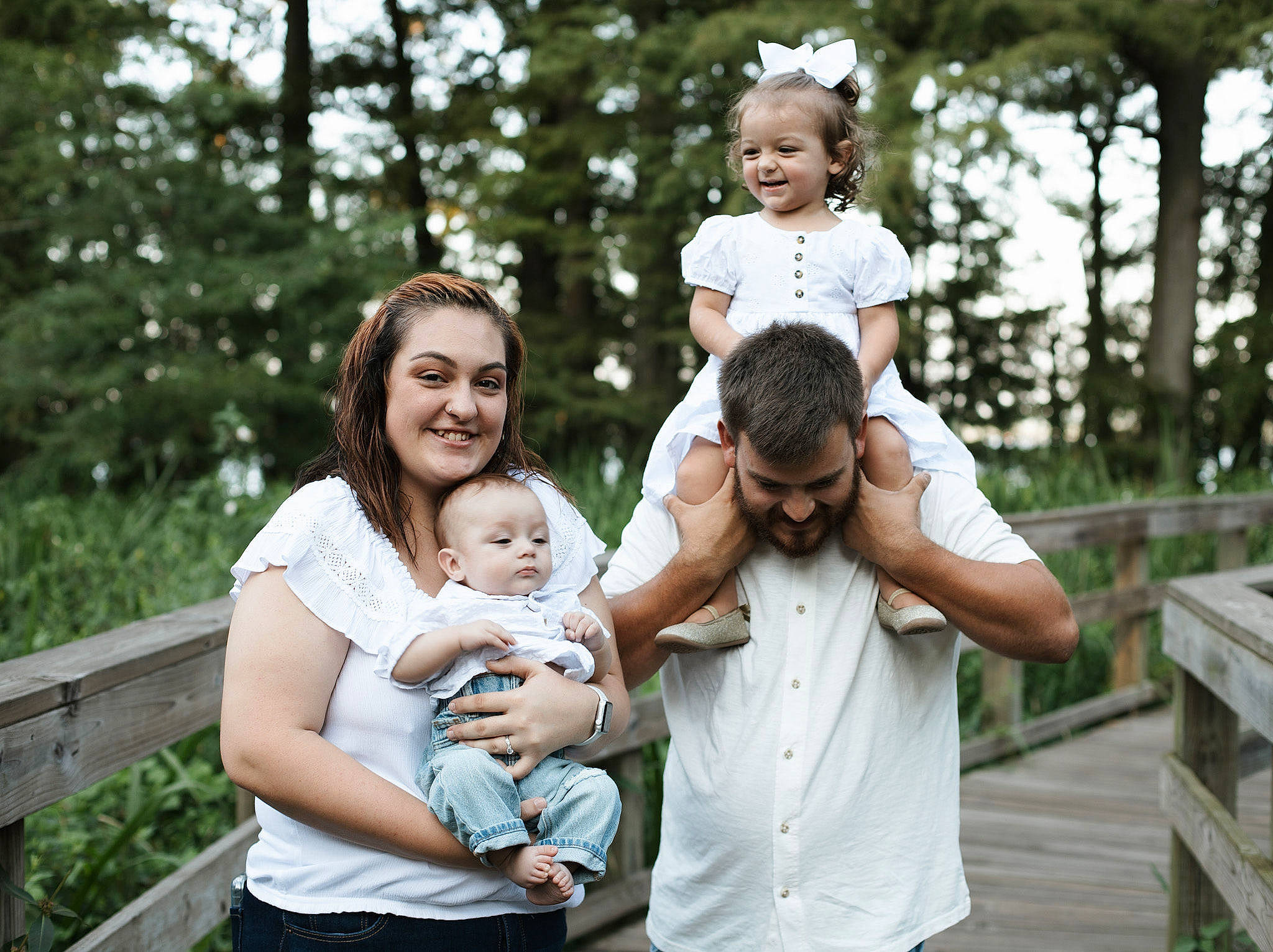 Bailie joined the competition — help win amazing prizes! baby, face, facial_expression, flash_photography, fun, gesture, grass, happy, interaction, joy, leaf, mammal, people_in_nature, person, photograph, plant, shorts, skin, smile, standing