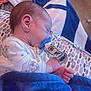 Beau is registered to the contest to win money with this photo: baby, blanket, child, clothing, comfort, cozy, cute, face, hand, indoor, infant, newborn, pacifier, pattern, peaceful, pillow, rest, sleeping, snuggle, soft