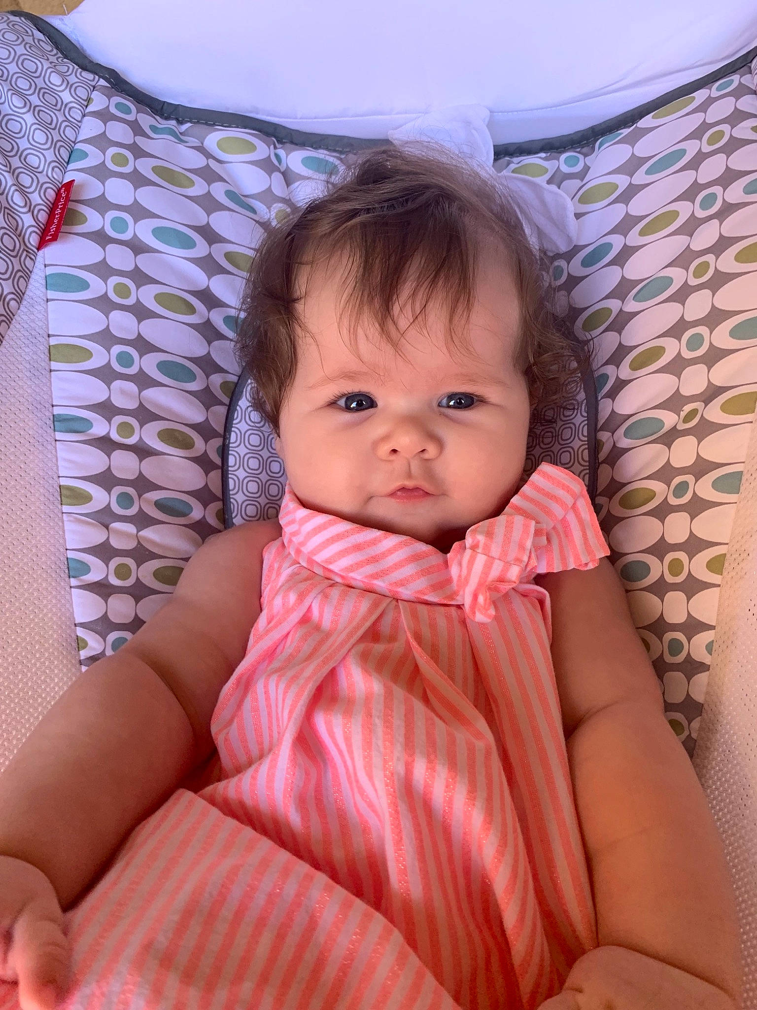 Arden joined the competition — help win amazing prizes! baby, beauty, cheek, child, daughter, dress, eye, face, head, iris, linens, lip, person, pink, sitting, skin, textile, toddler