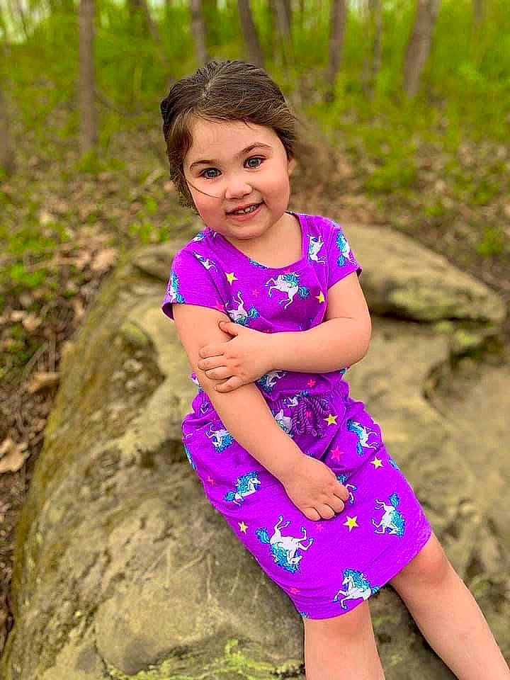 Brinley is registered to the contest to win money with this photo: day_dress, dress, eye, face, grass, hair, happy, head, joy, leaf, natural_environment, nature, one_piece_garment, people_in_nature, person, plant, shoulder, smile, summer, thigh