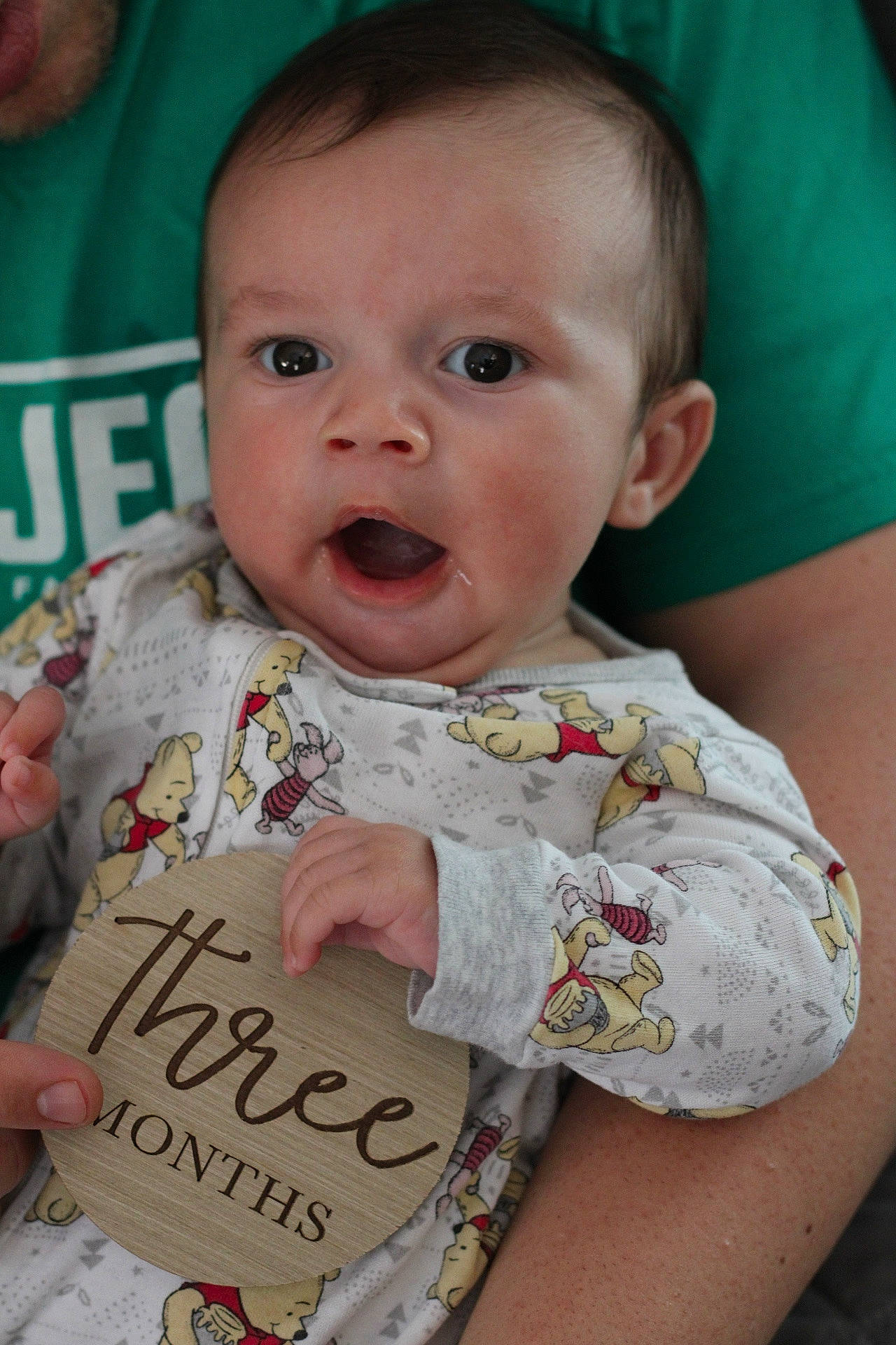 Caidan is registered to the contest to win money with this photo: baby, baby_toddler_clothing, cheek, child, chin, event, fun, grass, handwriting, happy, head, iris, lip, nose, person, sitting, skin, sleeve, smile, t_shirt