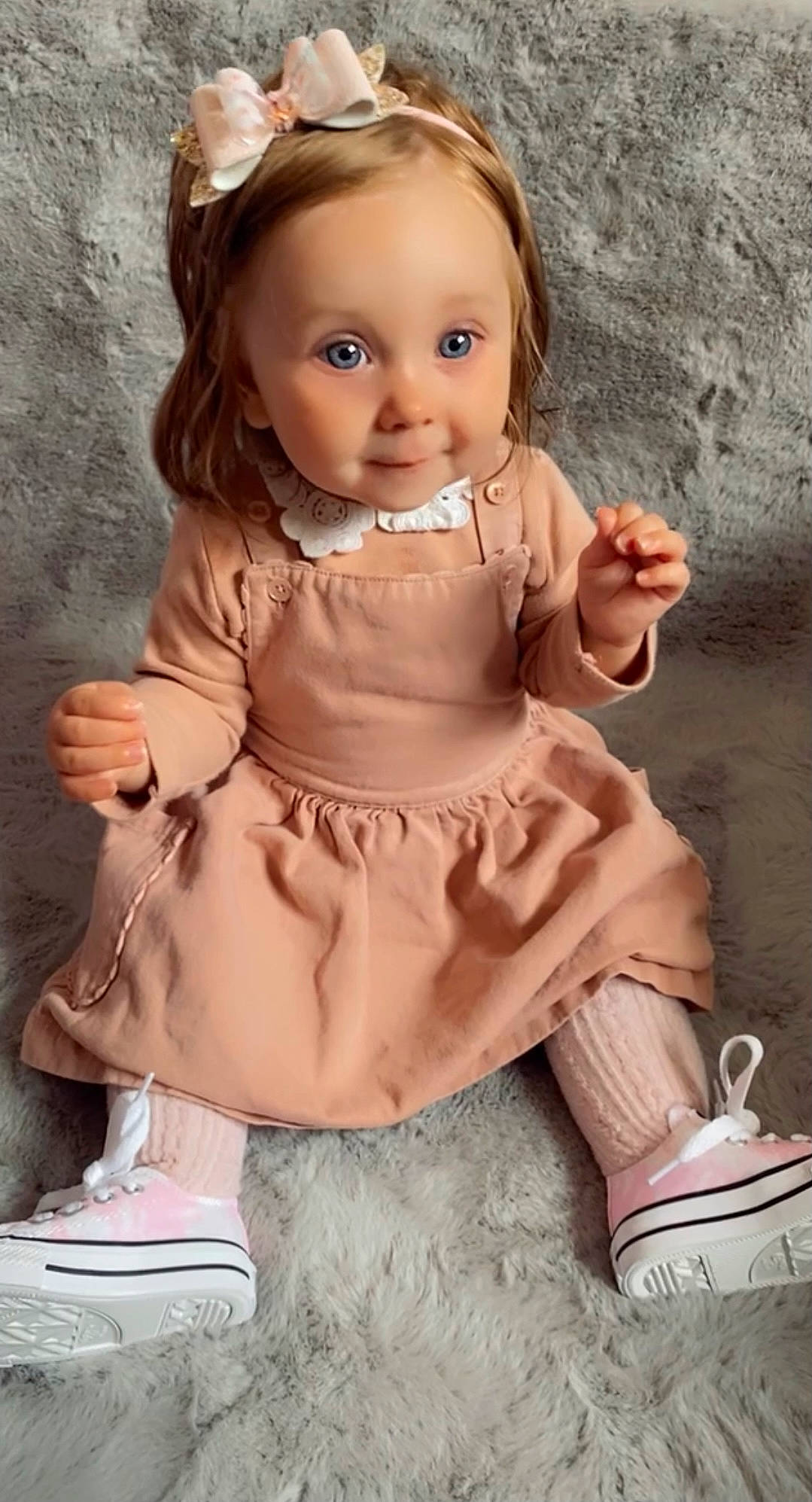 Maddison is registered to the contest to win money with this photo: baby_toddler_clothing, cheek, chin, doll, dress, eye, eyelash, fawn, finger, footwear, hand, happy, head, human, person, pink, shoe, skin, sleeve, toddler