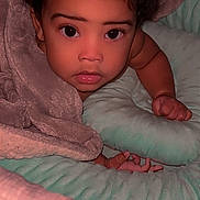 Blaze joined the competition — help win amazing prizes! baby, blanket, child, cozy, curly_hair, cushion, cute, expression, face, indoors, infant, looking, lying_down, person, portrait, resting, skin, soft_texture, toddler, young_child