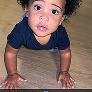 Blaze Jones joined the competition — help win amazing prizes! toddler, child, curly_hair, crawling, wooden_floor, indoor, looking_up, cute, blue_heart_emoji, snapchat_overlay, person, skin, hand, face, eyes, young_child, casual_clothing, flooring, baby, expression