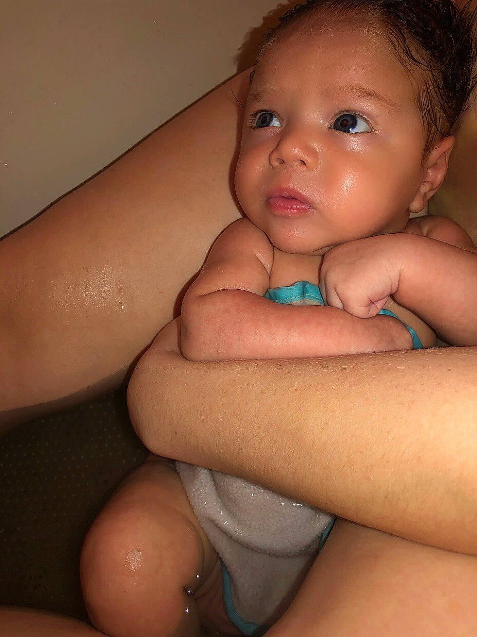 Liam is registered to the contest to win money with this photo: baby, bathing, cheek, chest, child, face, hand, mouth, muscle, nose, person, skin, toddler